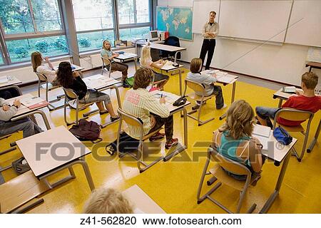 Classroom with students and teacher View Large Photo Image Stock Image - Classroom with students and teacher. Fotosearch