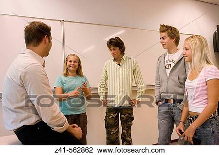 Classroom with students and teacher View Large Photo Image Stock Image - Classroom with students and teacher. Fotosearch