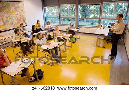 Classroom with students and teacher View Large Photo Image Stock Photo - Classroom with students and teacher. Fotosearch