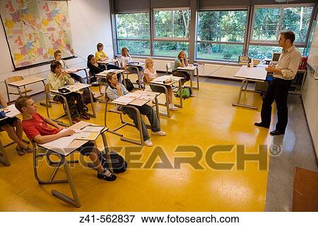 Classroom with students and teacher View Large Photo Image Stock Photo - Classroom with students and teacher. Fotosearch