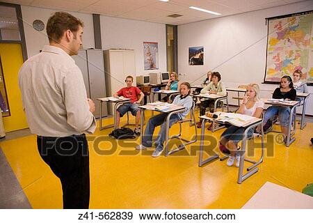 Classroom with students and teacher View Large Photo Image Stock Photo - Classroom with students and teacher. Fotosearch