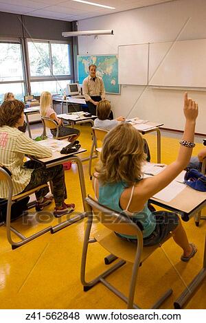 Classroom with students and teacher View Large Photo Image Stock Photo - Classroom with students and teacher. Fotosearch