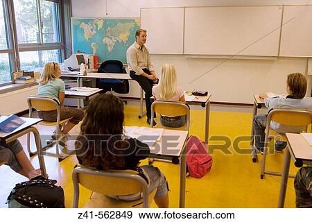 Classroom with students and teacher View Large Photo Image Stock Photo - Classroom with students and teacher. Fotosearch