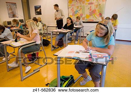 Classroom with students and teacher View Large Photo Image Stock Photograph - Classroom with students and teacher. Fotosearch