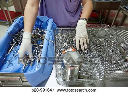 Cleaning surgical instruments, sterilization. Hospital Policlinica Gipuzkoa, San Sebastian, Donostia, Euskadi, Spain View Large Photo Image Stock Photo - Cleaning surgical instruments, sterilization. Hospital Policlinica Gipuzkoa, San Sebastian, Donostia, Euskadi, Spain. Fotosearch