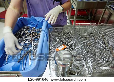 Cleaning surgical instruments, sterilization. Hospital Policlinica Gipuzkoa, San Sebastian, Donostia, Euskadi, Spain View Large Photo Image Stock Photograph - Cleaning surgical instruments, sterilization. Hospital Policlinica Gipuzkoa, San Sebastian, Donostia, Euskadi, Spain. Fotosearch
