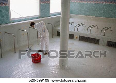 Stock Photo - Cleaning swimming-pool. Cestona spa. Gipuzkoa, Euskadi. Spain.. Fotosearch