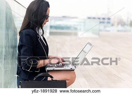 Stock Photo - Clerk working in the street. Fotosearch