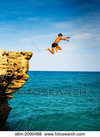 Stock Photo - Cliff jump. Cala Moreta. Begur. Costa Brava, Gerona. Catalonia, Spain, Europe.. Fotosearch