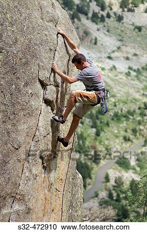 Climber. Cavallers. Vall de Boh?. Pyrenees. Lleida province. Spain. View Large Photo Image Stock Image - Climber. Cavallers. Vall de Boh?. Pyrenees. Lleida province. Spain.. Fotosearch