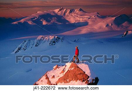 Climber on summit at sunset above Franz Josef Glacier. Westland National Park. New Zealand View Large Photo Image Stock Image - Climber on summit at sunset above Franz Josef Glacier. Westland National Park. New Zealand. Fotosearch