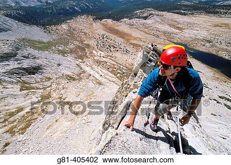 Stock Image - Climber on the West Ridge of Mt. Conness, Tuolumne Meadows area, Yosemite National Park, California. Fotosearch
