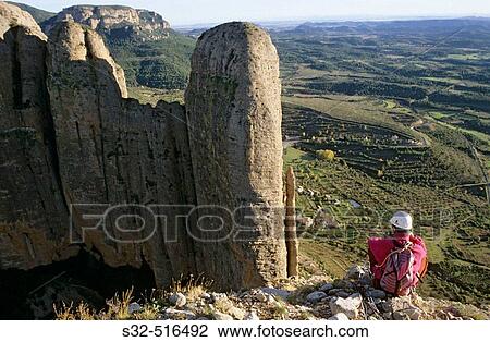 Stock Image - Climber resting at Mallo Fire. Riglos. Huesca province. Spain. Fotosearch