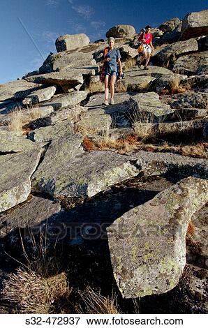 Stock Photo - Climbers descending from Pico de La Miel, La Cabrera. Madrid province. Spain.. Fotosearch