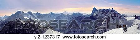 Climbers leaving Alguille du Midi for the Mont Blanc Massif, Chamonix Mont Blanc, France View Large Photo Image Stock Photo - Climbers leaving Alguille du Midi for the Mont Blanc Massif, Chamonix Mont Blanc, France. Fotosearch