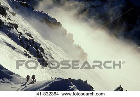 Climbers on Avalanche Peak - Mt Rolleston ridge Arthurs Pass National Park New Zealand View Large Photo Image Picture - Climbers on Avalanche Peak - Mt Rolleston ridge Arthurs Pass National Park New Zealand. Fotosearch