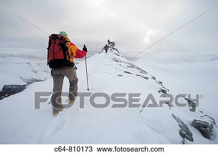 Climbing at the Svalbard mountains. Spitsbergen island, Svalbard archipelago, Arctic Ocean, Norway View Large Photo Image Stock Image - Climbing at the Svalbard mountains. Spitsbergen island, Svalbard archipelago, Arctic Ocean, Norway. Fotosearch