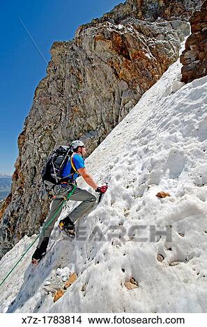 climbing The June Couloir on the North Face of Williams Peak high above the Sawtooth Valley in the Sawtooth Mountains near the town of Stanley in central Idaho View Large Photo Image Picture - climbing The June Couloir on the North Face of Williams Peak high above the Sawtooth Valley in the Sawtooth Mountains near the town of Stanley in central Idaho. Fotosearch