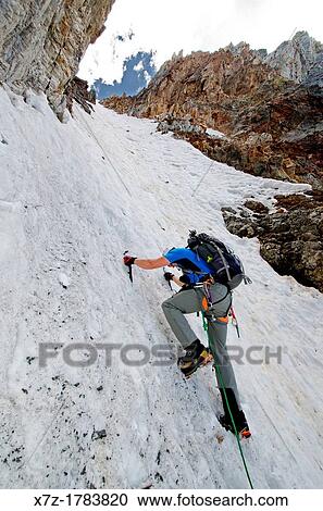 Stock Image - climbing The June Couloir on the North Face of Williams Peak high above the Sawtooth Valley in the Sawtooth Mountains near the town of Stanley in central Idaho. Fotosearch
