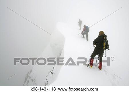 Climbing the peak Posets, 3375 meters, along the ridge Gistain Valley Pyrenees Aragon Spain Huesca View Large Photo Image Stock Photo - Climbing the peak Posets, 3375 meters, along the ridge Gistain Valley Pyrenees Aragon Spain Huesca. Fotosearch