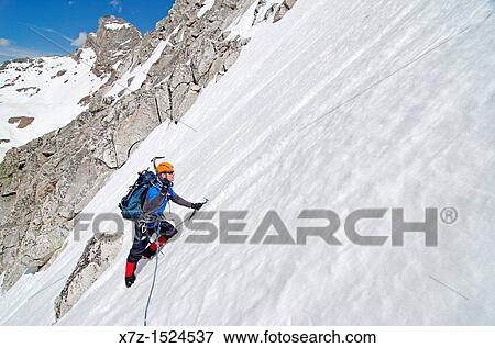 Climbing the Vertical Perceptions Couloir on the North Face of Cobb Peak in the Pioneer Mountians of central Idaho View Large Photo Image Stock Photo - Climbing the Vertical Perceptions Couloir on the North Face of Cobb Peak in the Pioneer Mountians of central Idaho. Fotosearch
