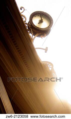 Clock above the building View Large Photo Image Stock Photo - Clock above the building. Fotosearch