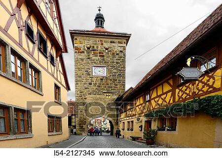 Stock Photography - Clock Tower Street Arch Rothenburg Germany DE Franconia Bavaria.. Fotosearch
