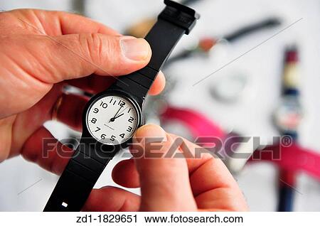 Stock Image - Clocks and watches isolated on white. Fotosearch