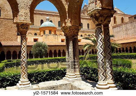 Picture - Cloisters with decorated coloumns of Monreale Cathedral - Palermo - Sicily. Fotosearch