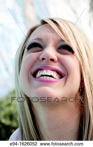 Close in shot of a 31 year old blond woman with a big smile View Large Photo Image Stock Image - Close in shot of a 31 year old blond woman with a big smile. Fotosearch