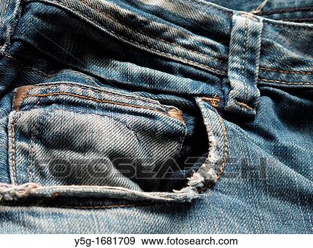 close up detail of blue denim jeans trousers pants View Large Photo Image Stock Photo - close up detail of blue denim jeans trousers pants. Fotosearch