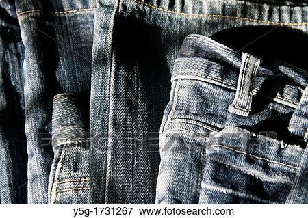 close up detail of blue denim jeans trousers pants View Large Photo Image Stock Photo - close up detail of blue denim jeans trousers pants. Fotosearch