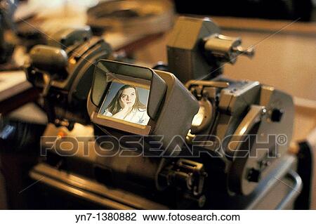 close up of a 35 mm movie film editor viewer with an image of a young girl on the screen View Large Photo Image Stock Image - close up of a 35 mm movie film editor viewer with an image of a young girl on the screen. Fotosearch