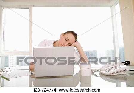 Picture - Close-up of a businesswoman looking depressed. Fotosearch