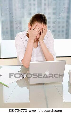 Close-up of a businesswoman looking depressed View Large Photo Image Stock Image - Close-up of a businesswoman looking depressed. Fotosearch