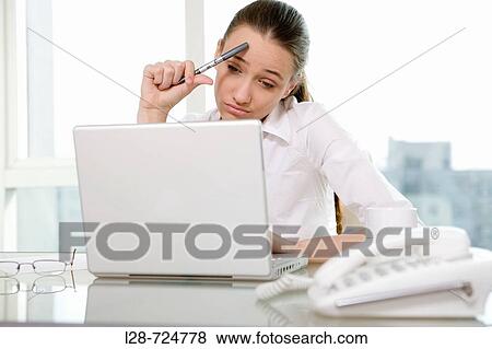 Close-up of a businesswoman looking depressed View Large Photo Image Stock Photo - Close-up of a businesswoman looking depressed. Fotosearch