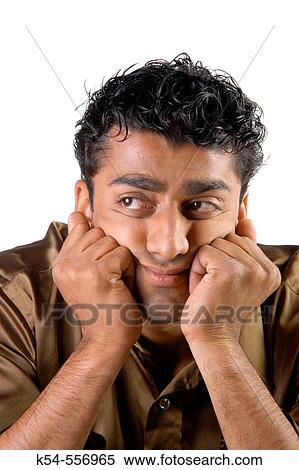 Stock Photography - Close up of a confused man.. Fotosearch