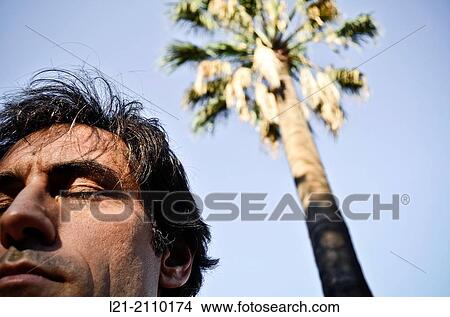 Close-up of a face of an adult man. Closed eyes, calm. View Large Photo Image Picture - Close-up of a face of an adult man. Closed eyes, calm.. Fotosearch