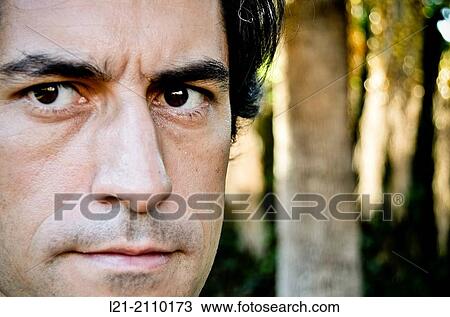 Close-up of a face of an adult man. View Large Photo Image Stock Image - Close-up of a face of an adult man.. Fotosearch