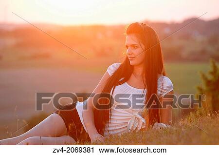 Close-up of a good looking young lady in nature, Bavaria, Germany. View Large Photo Image Stock Image - Close-up of a good looking young lady in nature, Bavaria, Germany.. Fotosearch