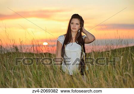 Close-up of a good looking young lady in nature, Bavaria, Germany. View Large Photo Image Stock Image - Close-up of a good looking young lady in nature, Bavaria, Germany.. Fotosearch