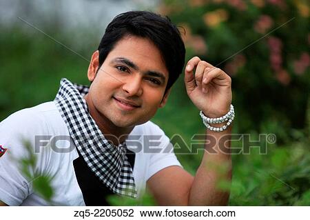 Close up of a happy young man, Pune, India. View Large Photo Image Stock Image - Close up of a happy young man, Pune, India.. Fotosearch