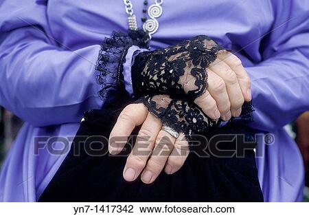 Close up of a middle aged woman's hands folded in repose, her costume that of the middle eighteen hundreds featuring black lace cuffs View Large Photo Image Stock Image - Close up of a middle aged woman's hands folded in repose, her costume that of the middle eighteen hundreds featuring black lace cuffs. Fotosearch