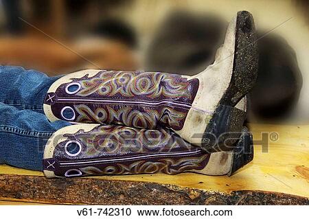 Stock Image - close up of a pair of fancy cowboy boots. Fotosearch