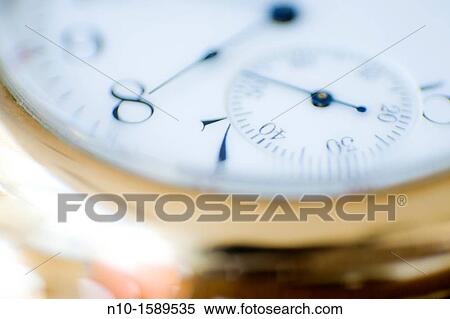 Close-up of a pocket watch View Large Photo Image Stock Photography - Close-up of a pocket watch. Fotosearch
