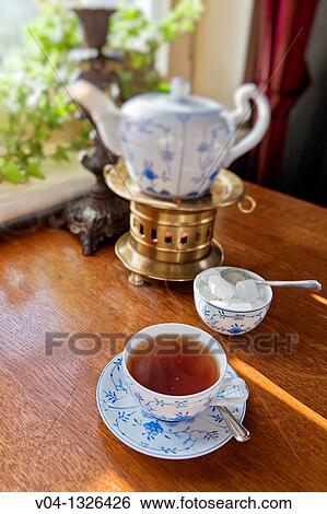 Close up of a traditional east frisian tea time in a tearoom on the island of Spiekeroog, Lower Saxony, Germany, Europe View Large Photo Image Stock Photograph - Close up of a traditional east frisian tea time in a tearoom on the island of Spiekeroog, Lower Saxony, Germany, Europe. Fotosearch