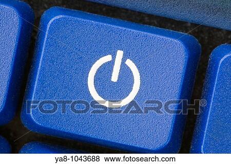 Close-up of a white power switch symbol on blue key View Large Photo Image Stock Photo - Close-up of a white power switch symbol on blue key. Fotosearch