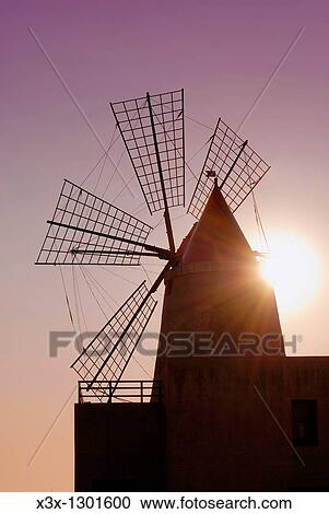 Close up of a windmill used in the saline production of Mozia Sicily Italy View Large Photo Image Stock Image - Close up of a windmill used in the saline production of Mozia Sicily Italy. Fotosearch