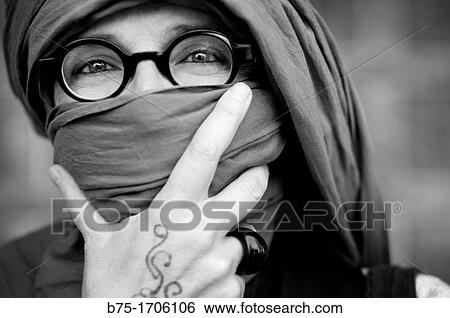 Close up of a woman portrait with glasses and hijab View Large Photo Image Stock Photograph - Close up of a woman portrait with glasses and hijab. Fotosearch