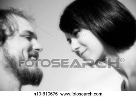 Close-up of a young couple View Large Photo Image Stock Photograph - Close-up of a young couple. Fotosearch